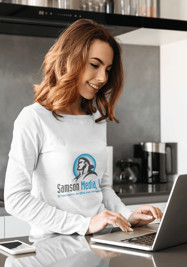 Why Websites Still Matter Lady on laptop with a Samson Media Shirt